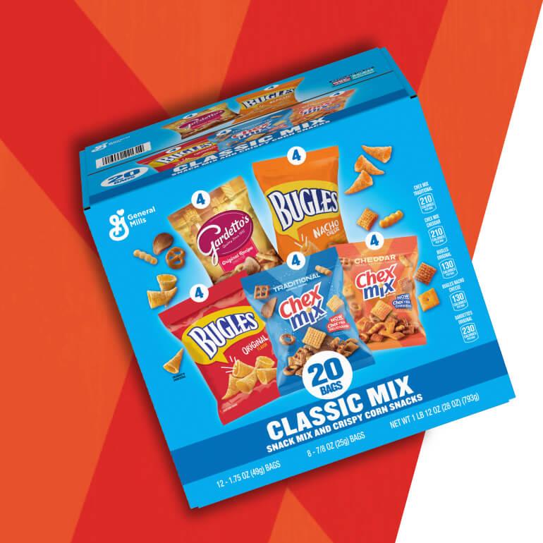 A General Mills snack box labeled 'Classic Mix' containing 20 bags of snack mix and crispy corn snacks. The box includes 4 bags each of Gardetto's, Bugles Original, Bugles Nacho Cheese, Chex Mix Traditional, and Chex Mix Cheddar. Nutritional information is visible on the side of the box.
